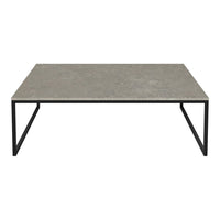 Gray concrete table top with a sleek black metal frame, showcasing modern minimalism.