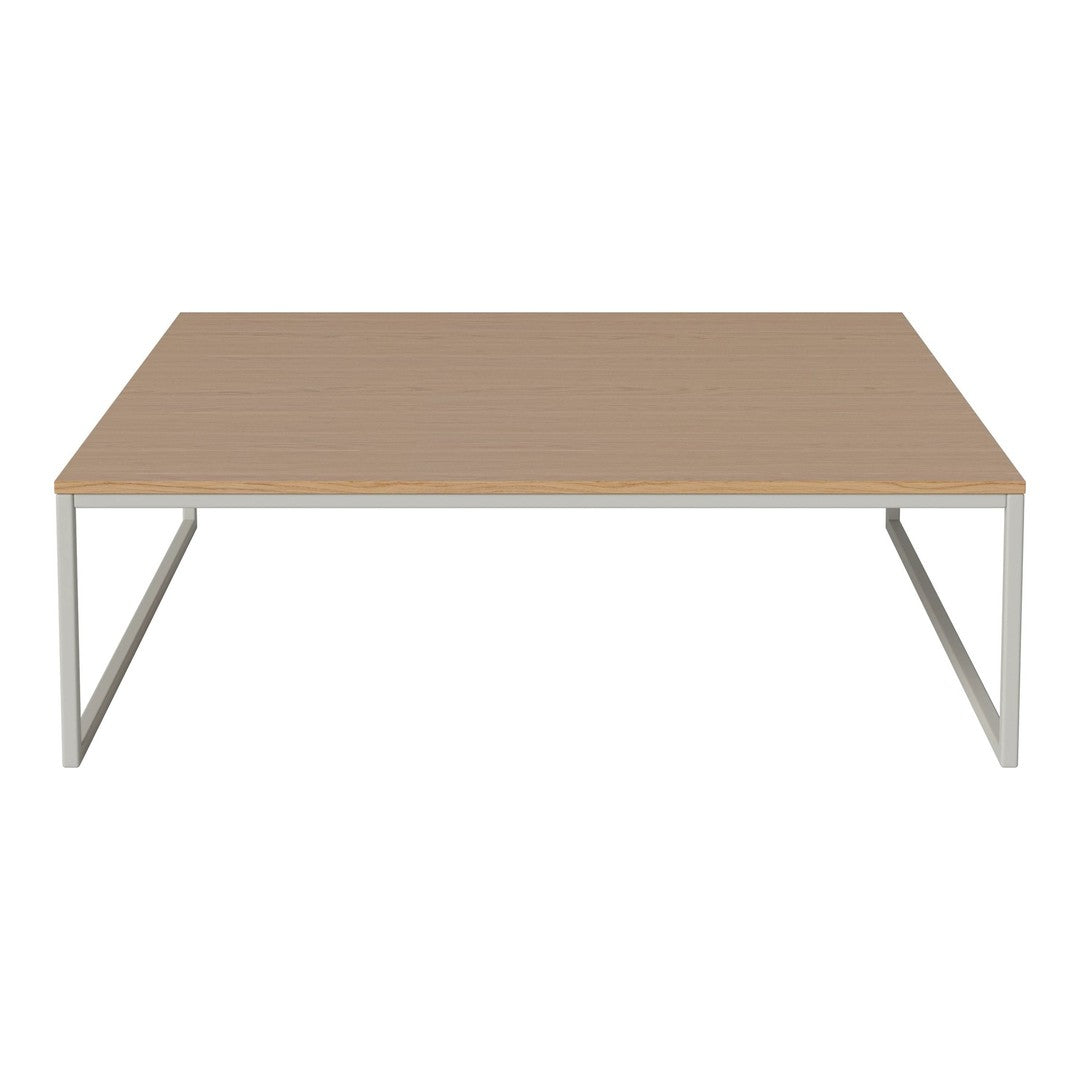 Light brown wooden tabletop with a smooth finish and sleek silver metal legs. Modern, minimalistic design.