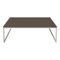 Brown rectangular coffee table with a smooth finish and sleek silver metal legs. Modern and minimalistic design.