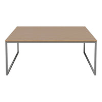 Light wood tabletop with a smooth finish, paired with sleek metal gray legs for a modern aesthetic.