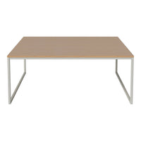 "Modern rectangular table with a light wood grain surface and sleek silver metal legs."