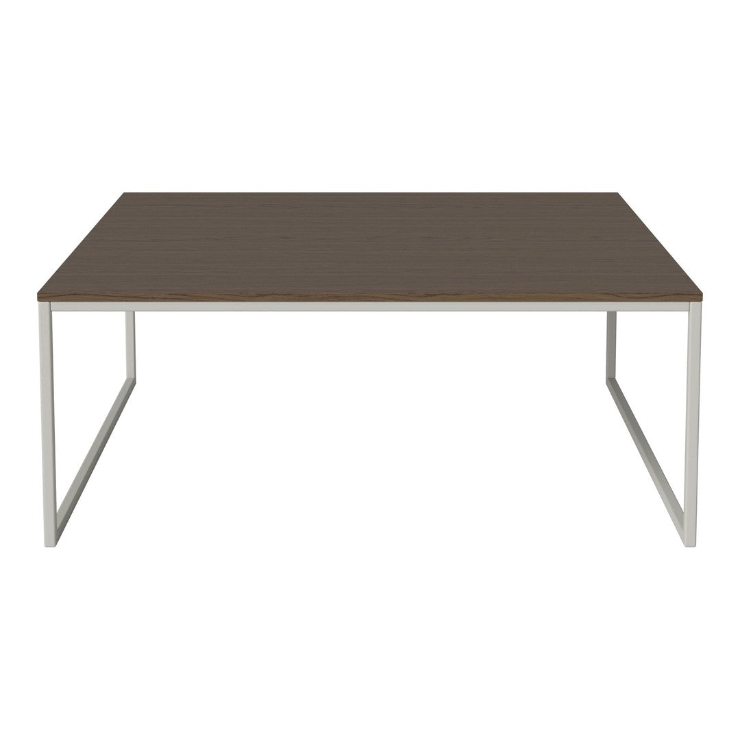 Modern rectangular table with a rich brown wood top and sleek silver metal legs. Ideal for contemporary settings.