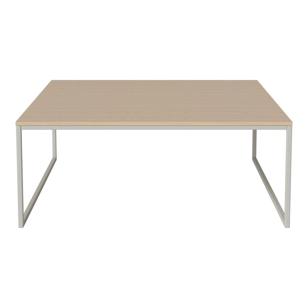 Light wood tabletop with a smooth finish and minimalist silver metal frame. Modern and stylish design perfect for any space.