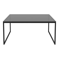 Modern black metal frame coffee table with a sleek, dark glass top. Minimalist design complements any decor style.