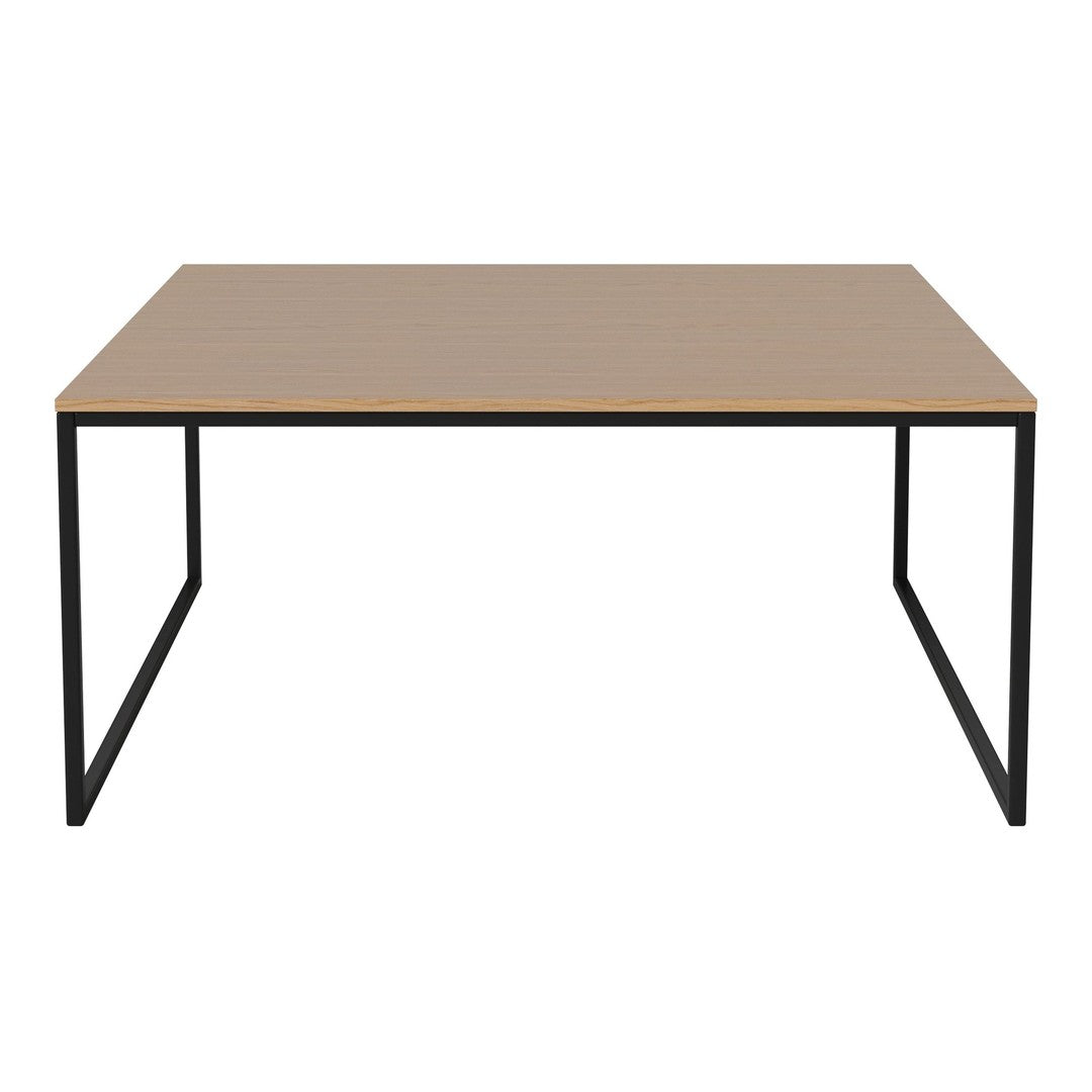 Minimalist rectangular table with a light wooden top and sleek black metal frame, perfect for modern decor.