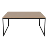 Minimalist rectangular table with a light wooden top and sleek black metal frame, perfect for modern decor.