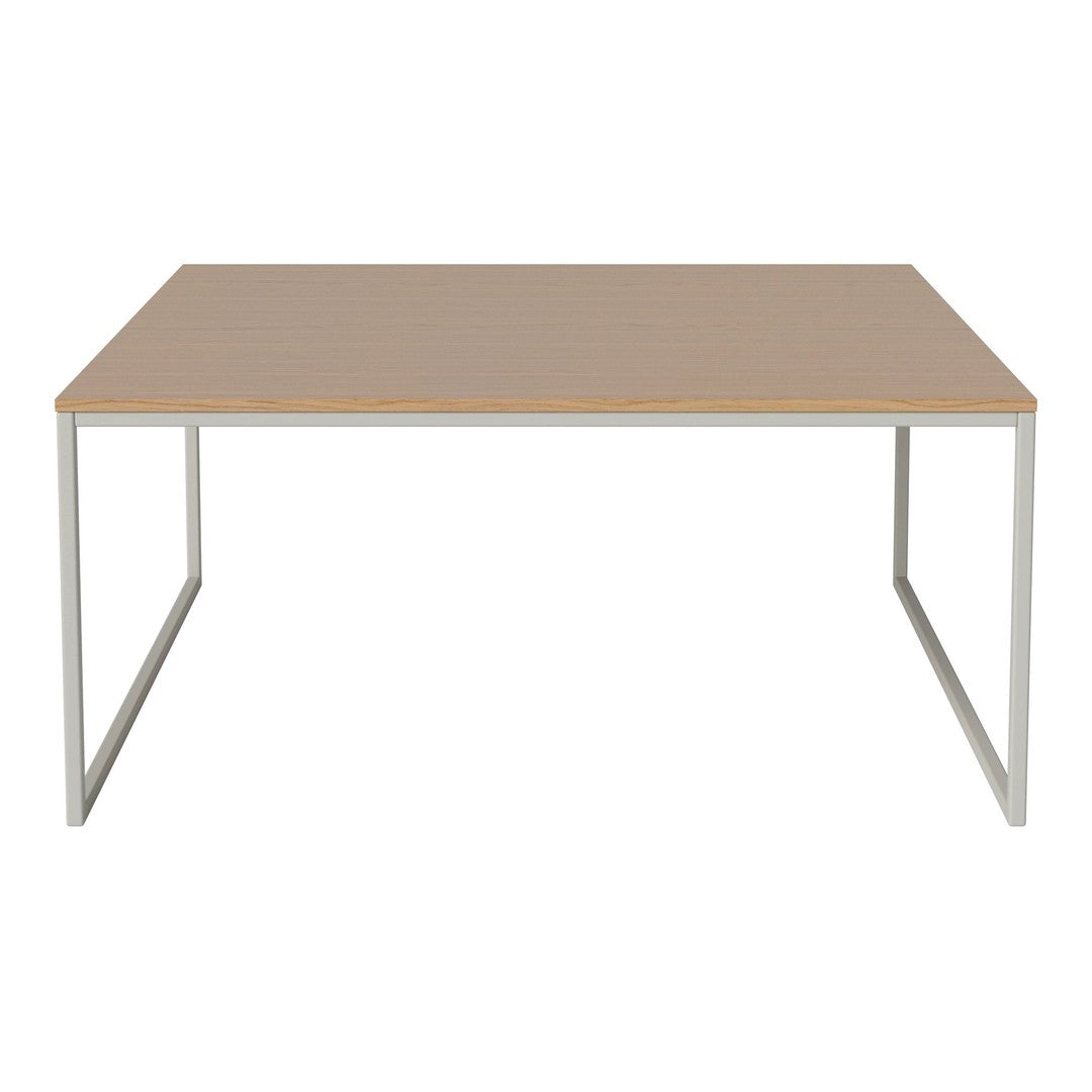 Light wood tabletop with a smooth finish, supported by a minimalist silver metal frame; modern and sleek design.
