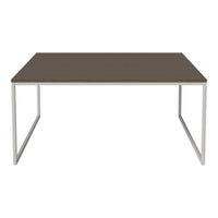 Brown wooden tabletop with a sleek silver metal frame, showcasing a minimalist design and modern aesthetics.