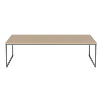 Light wood tabletop with a smooth finish, supported by sleek gray metal legs. Modern and minimalistic design.