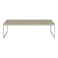 Light grey rectangular coffee table with a smooth top and sleek white metal frame. Modern and minimalist design.
