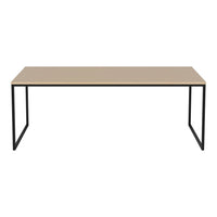 Beige tabletop with a sleek black metal frame, minimalistic design perfect for modern decor.