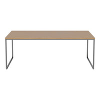 Light wood tabletop with a smooth finish, supported by sleek metal legs in a modern silver hue.