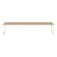 Beige rectangular tabletop with a smooth finish, supported by sleek white metal legs. Minimalist and modern design.