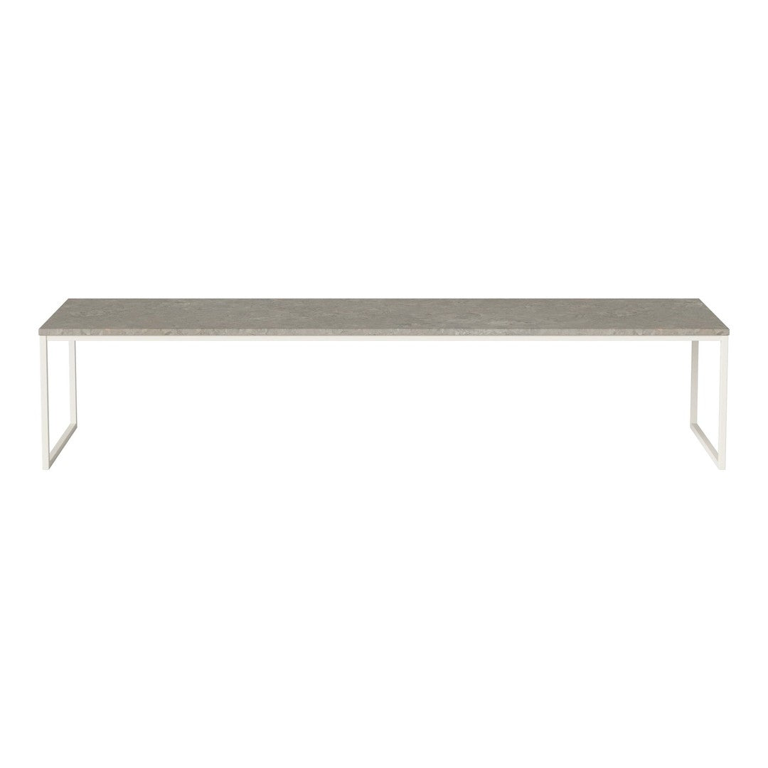Rectangular table with a textured gray surface and minimalist white metal legs, perfect for modern decor.