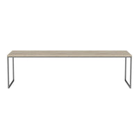 "Light wood table with sleek gray metal legs, featuring a minimalist design and smooth surface."