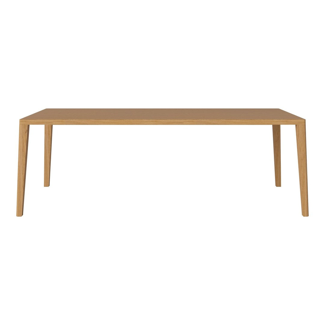 Natural wood dining table in a smooth, light oak finish with clean lines and a minimalist design.