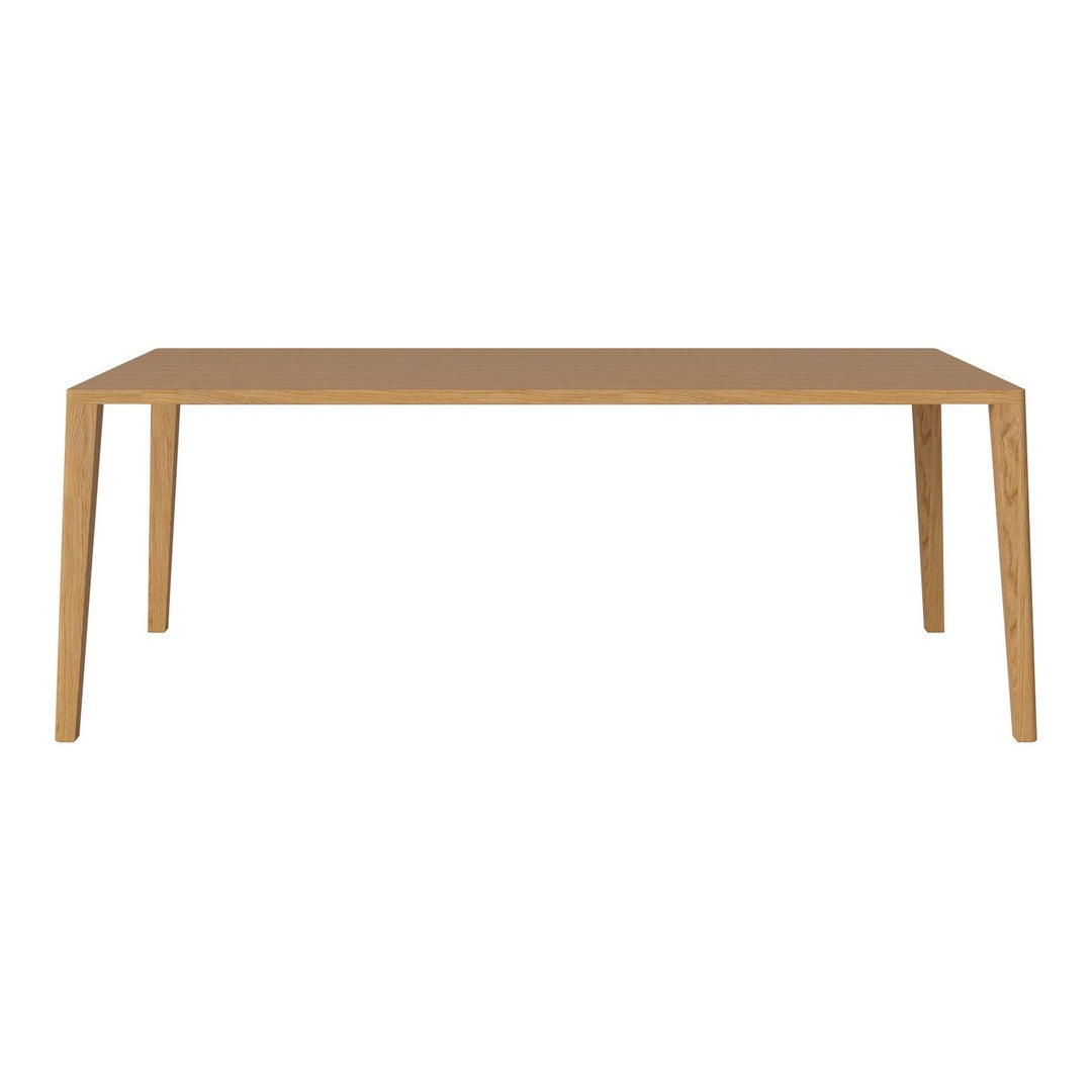 Light oak dining table with a minimalist design and clean lines, showcasing a natural wood grain pattern.