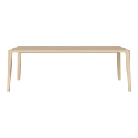 Light beige rectangular dining table with clean lines and smooth surface, perfect for modern interiors.