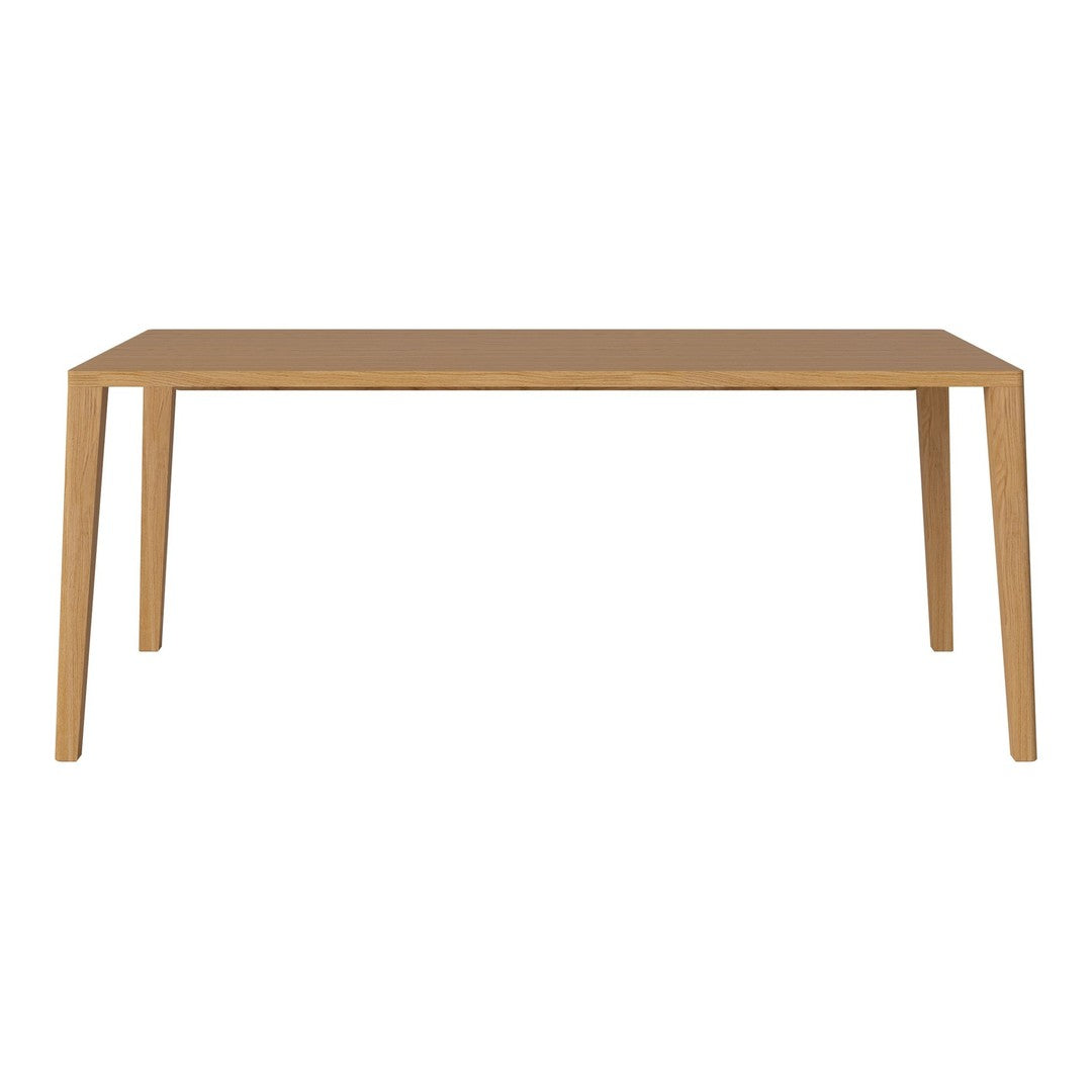 Light oak wooden dining table with a smooth, solid surface and minimalist design. Modern natural finish.