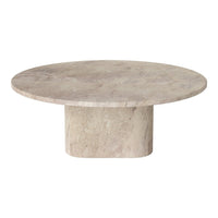Round beige marble coffee table with a smooth, matte finish and minimalist design. Perfect for modern decor.