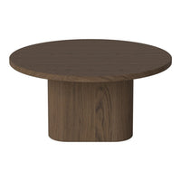 Round coffee table in rich dark brown wood finish with a smooth surface and modern cylindrical base.