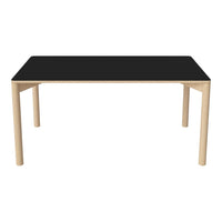 Black tabletop with natural wood legs, featuring a sleek and minimalist design. Perfect for modern decor.