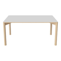 White tabletop with light wood legs, featuring a sleek, modern design and minimalistic aesthetic.