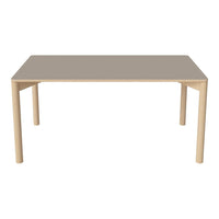 "Modern rectangular dining table with a smooth taupe surface and light wood legs, featuring a minimalist design."