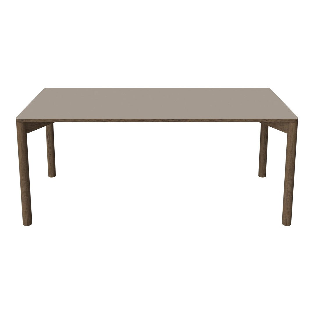 Rectangular dining table in a sleek light brown finish with smooth, matte surface and minimalist design.