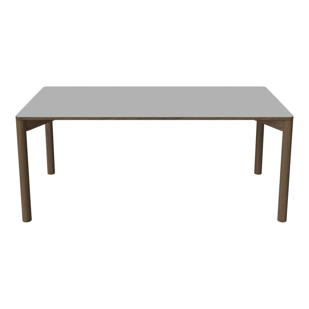 Gray tabletop with smooth finish and brown wood legs, perfect for a modern dining space.