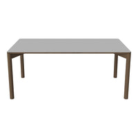 Gray tabletop with smooth finish and brown wood legs, perfect for a modern dining space.