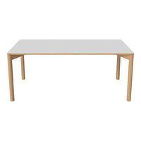 Minimalist white tabletop with natural wood legs, featuring a sleek, modern design suitable for various decor styles.