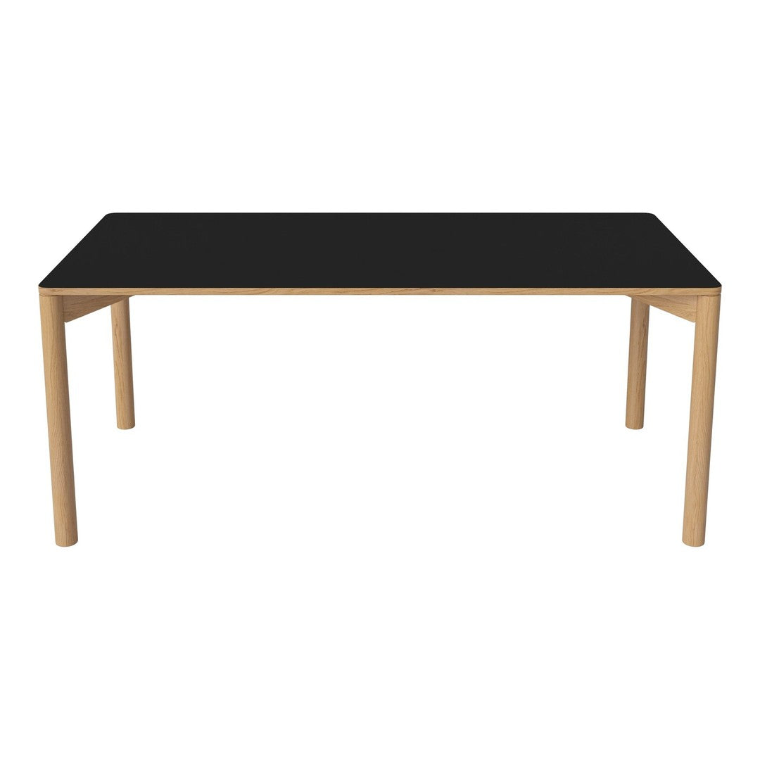 Black rectangular table with light wood legs, featuring a minimalist design and smooth surface. Perfect for modern decor.
