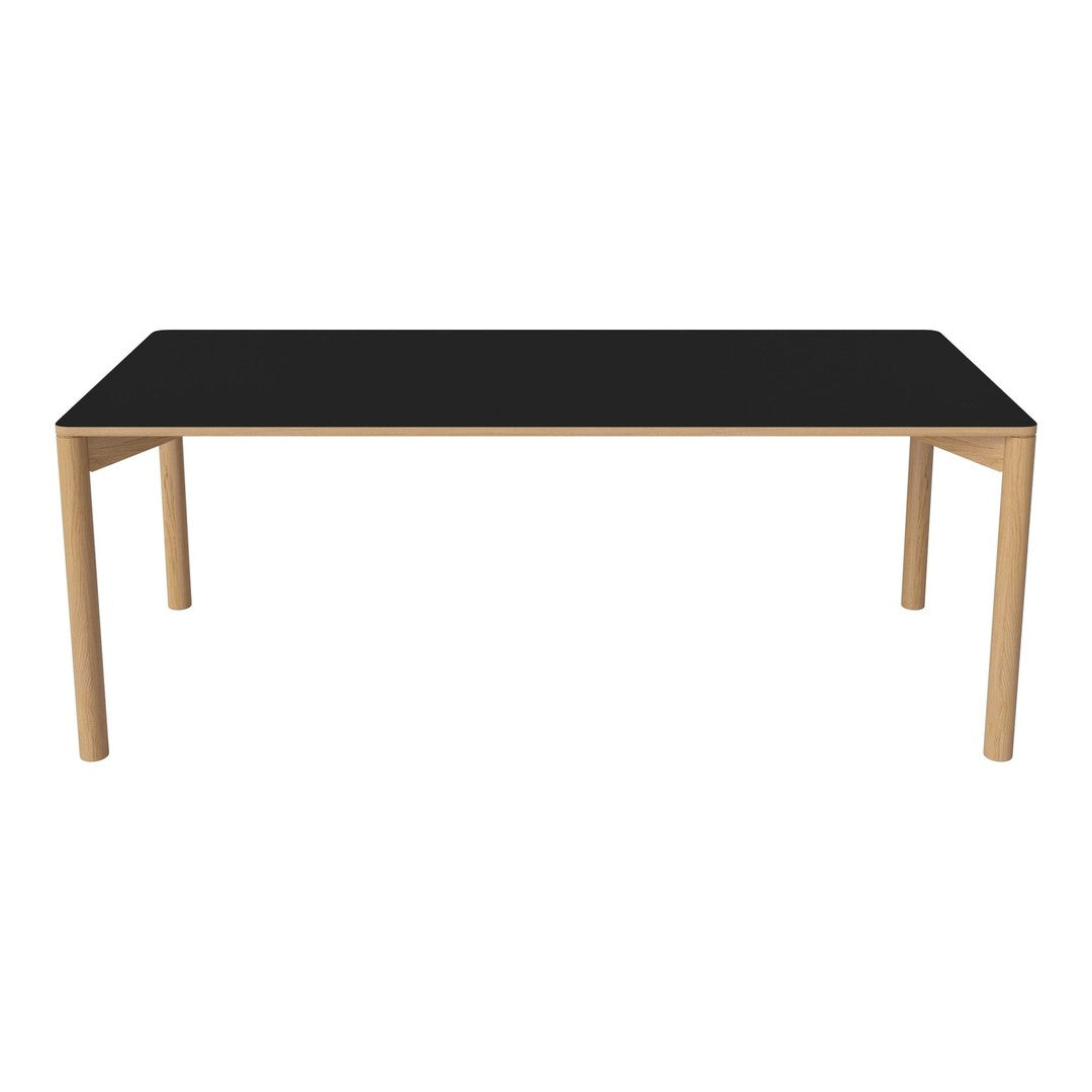 Black tabletop with natural wood legs, featuring a sleek, minimalist design for modern decor.