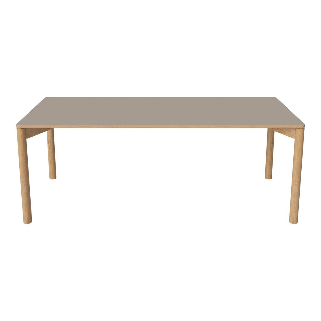 Minimalist beige tabletop with natural wood legs, perfect for modern dining spaces. Simple and elegant design.