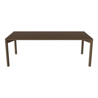 Brown rectangular dining table with a sleek, modern design and clean lines, perfect for contemporary interiors.