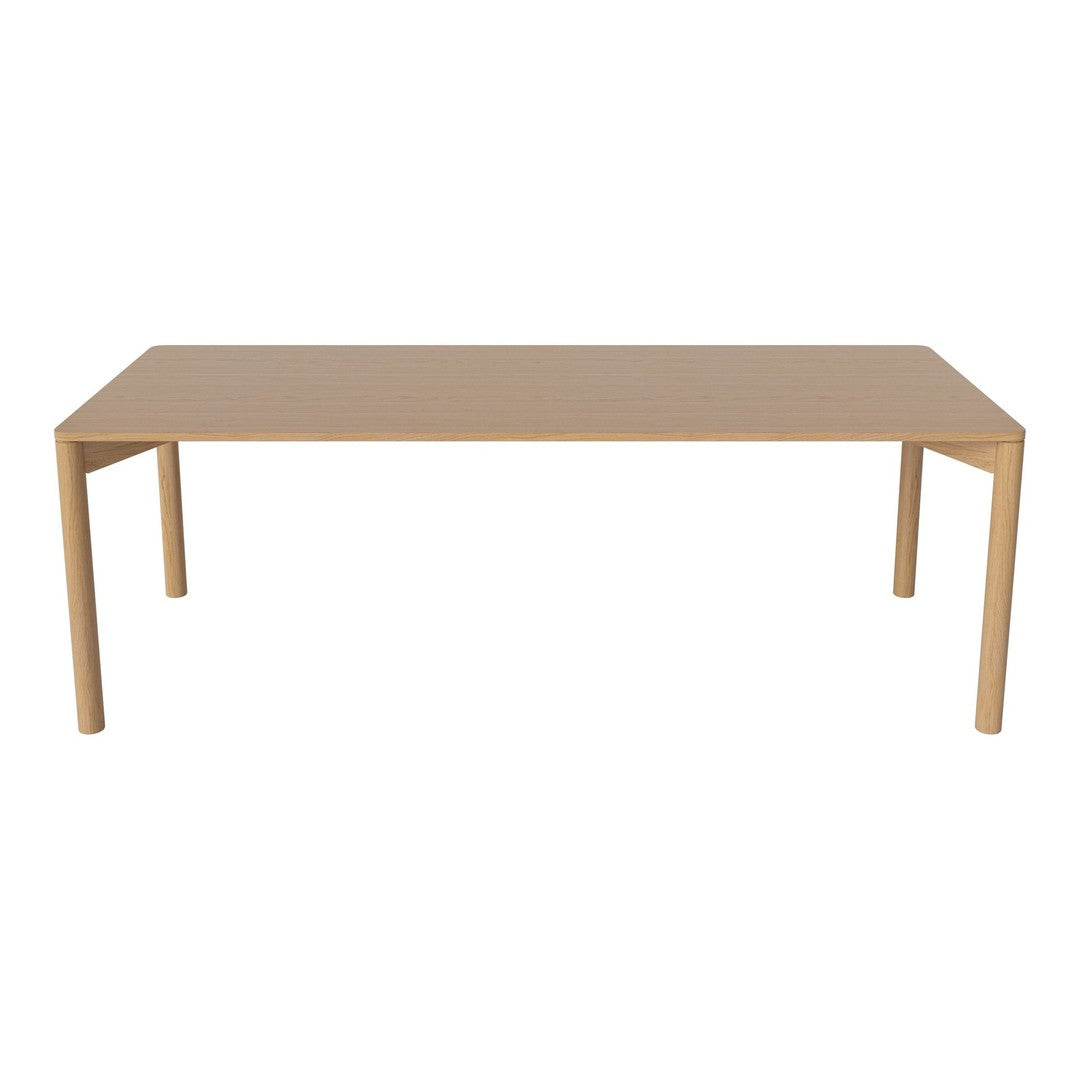 Light beige rectangular table with a smooth surface and minimalistic design, perfect for modern decor.