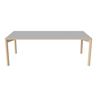 Light gray tabletop with natural wood legs, featuring a sleek, minimalist design. Perfect for modern interiors.
