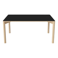 "Modern rectangular dining table with a sleek black top and natural wood legs, showcasing a minimalist design."