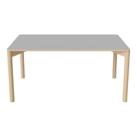 Light gray tabletop with natural wood legs; sleek and minimalist design suitable for modern decor.
