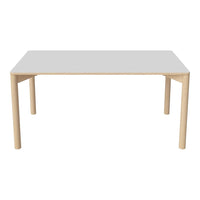"Modern white table with natural wood legs, featuring a sleek, minimalist design and smooth surface."
