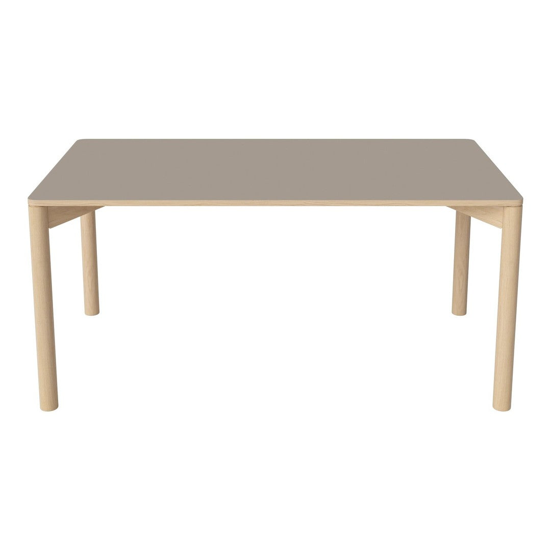 Light beige rectangular table with a smooth, solid gray surface and natural wood legs, perfect for modern dining spaces.