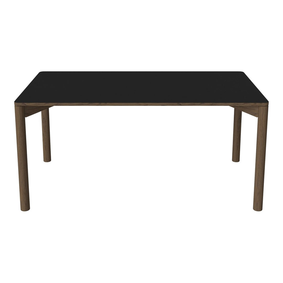 Black rectangular table with a smooth surface and natural wood finish legs, perfect for modern decor.