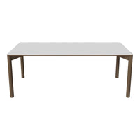 Modern white rectangular table with sleek brown legs, showcasing a minimalist design and smooth surface.