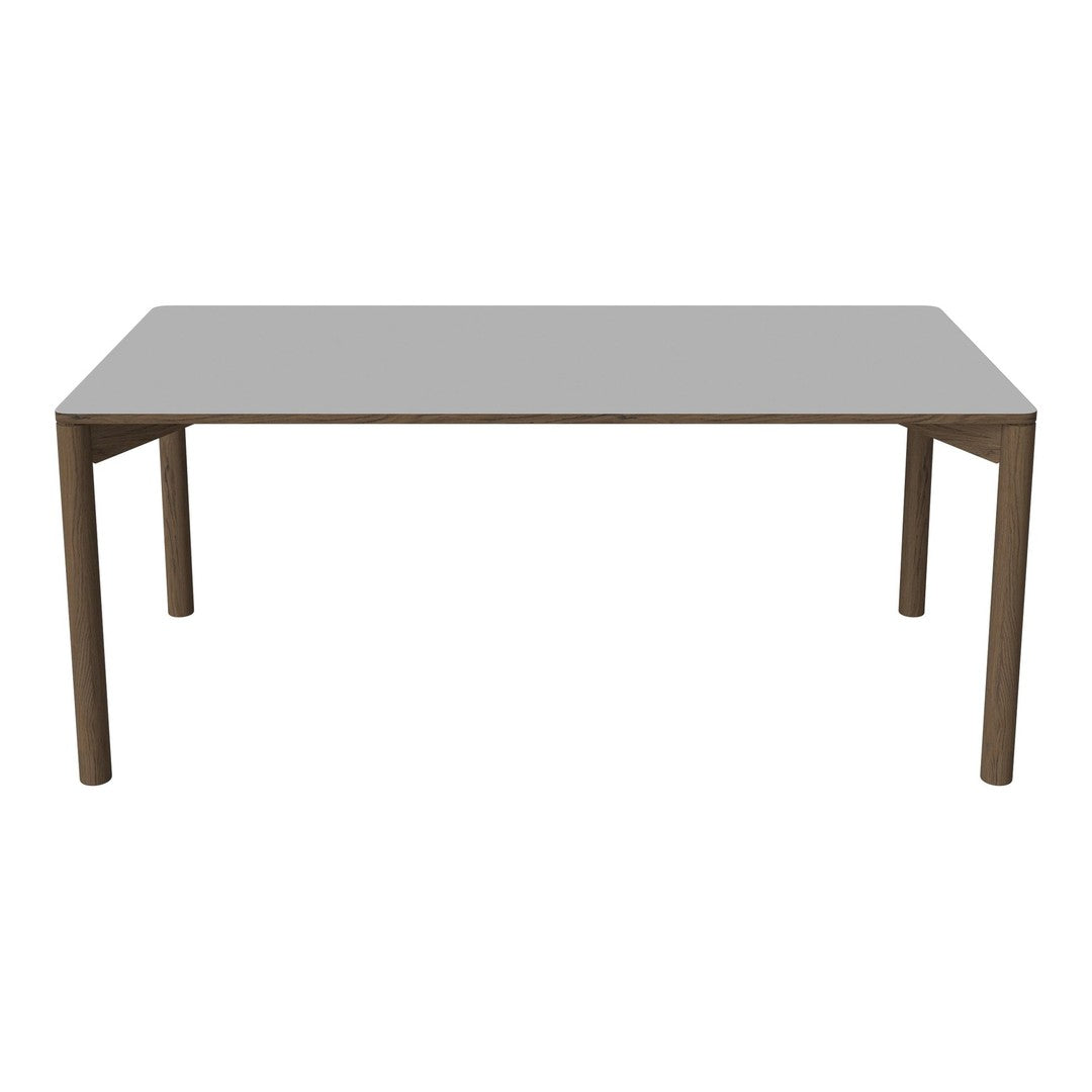 Gray rectangular table with a smooth surface and wooden legs in a natural finish. Simple, modern design.