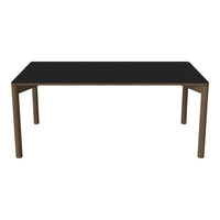 Black tabletop with a sleek, modern brown frame, perfect for contemporary dining spaces.