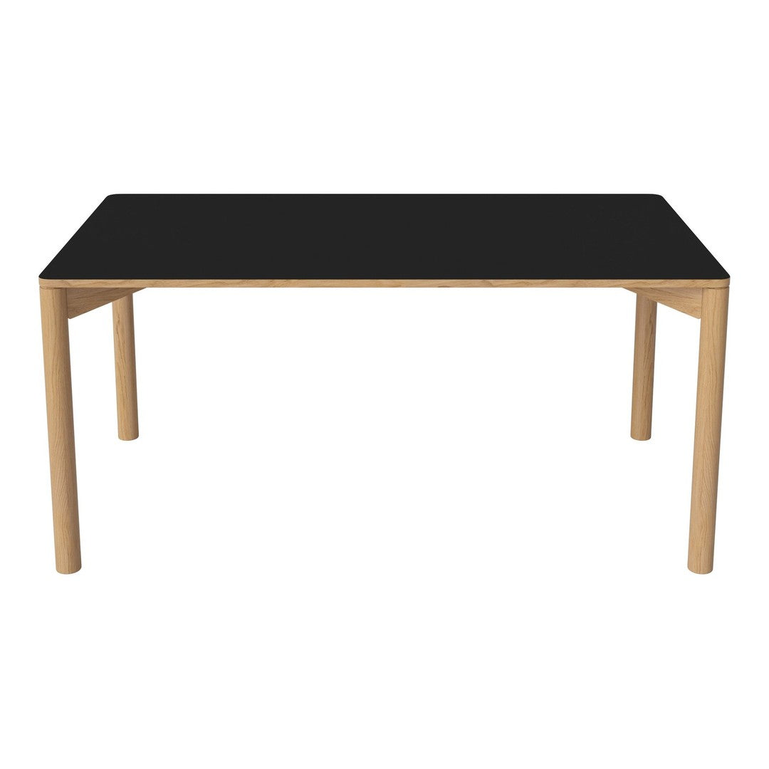 Black table top with natural wood legs, featuring a minimalist design and smooth surface. Perfect for modern decor.