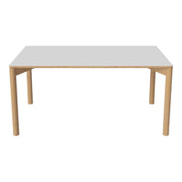 White tabletop with natural wood legs, featuring a minimalist design perfect for modern decor.