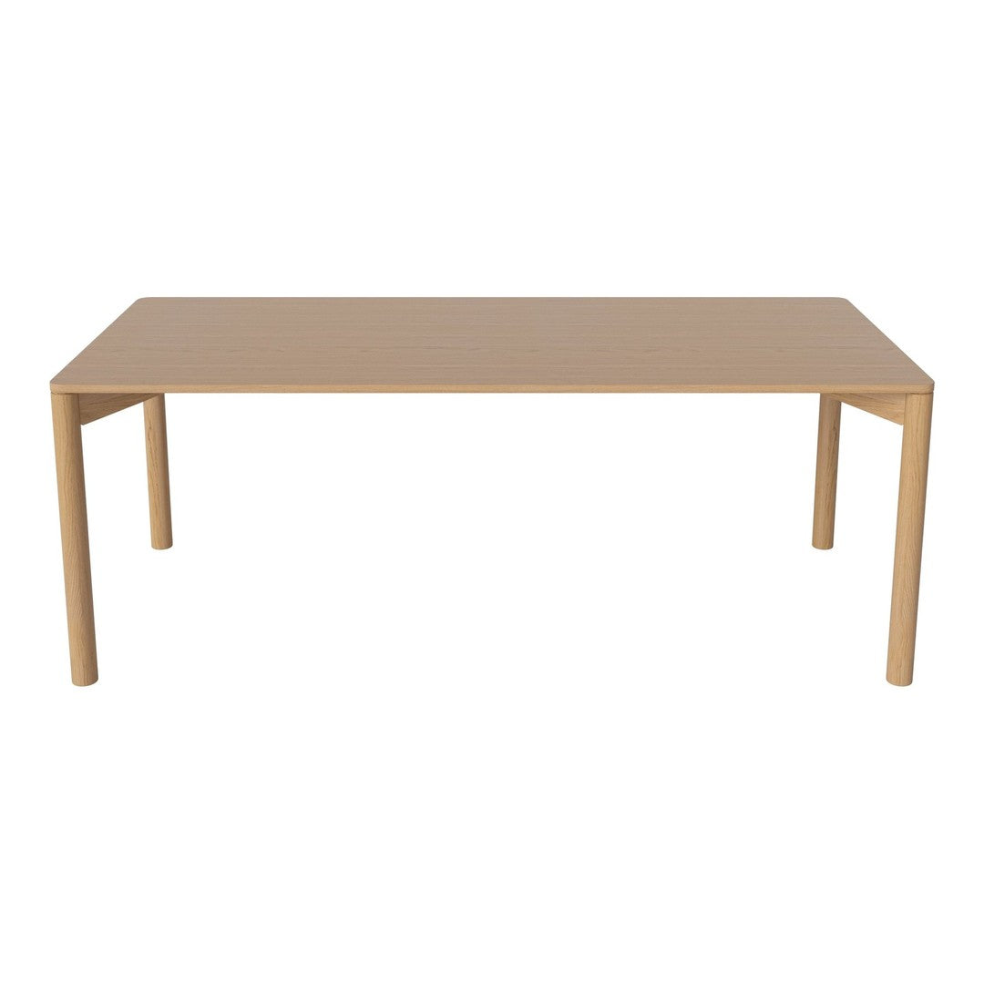Beige rectangular table with a smooth surface and simple design, featuring solid, straight legs. Ideal for modern decor.