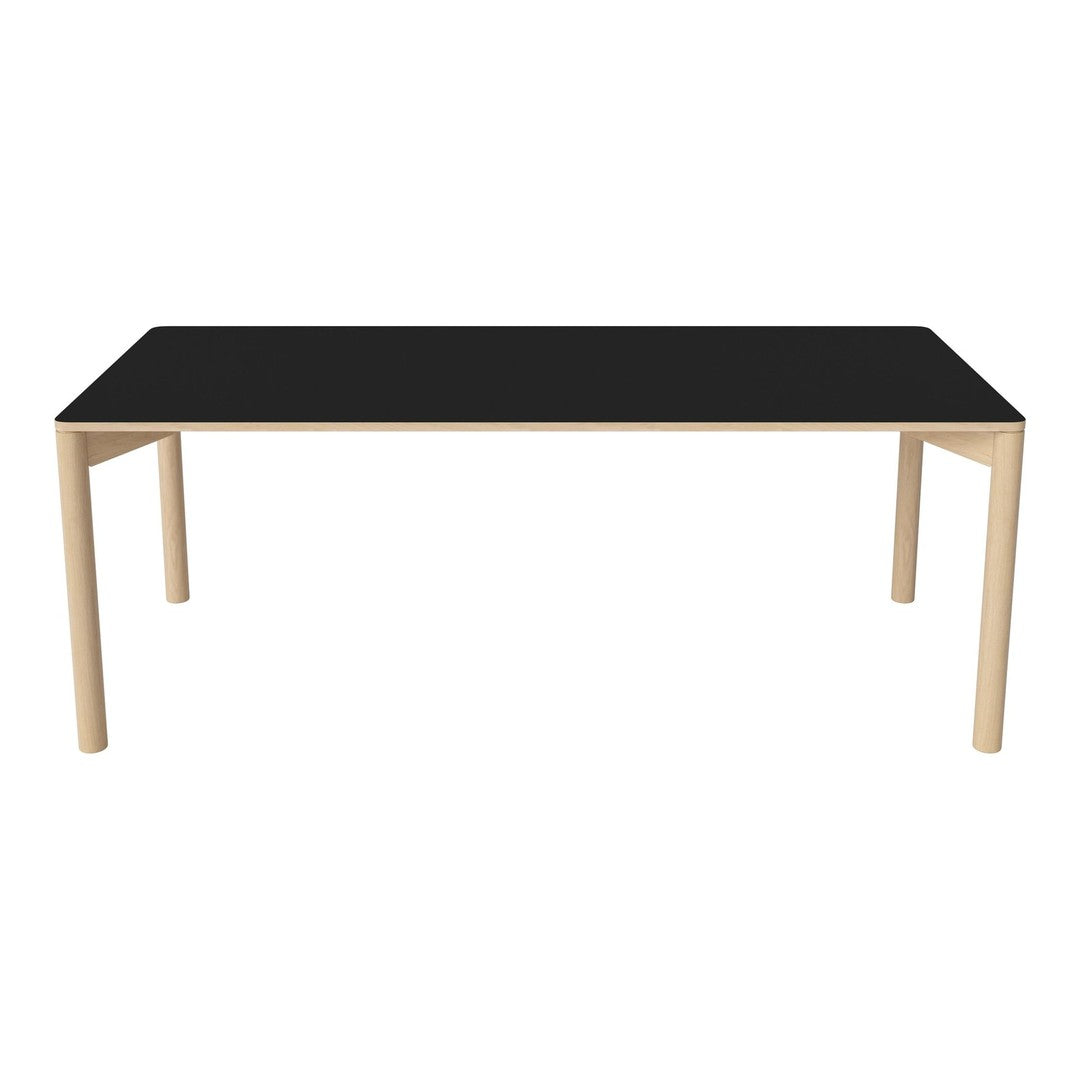 Black tabletop with natural wood legs, featuring a sleek, modern design perfect for contemporary spaces.